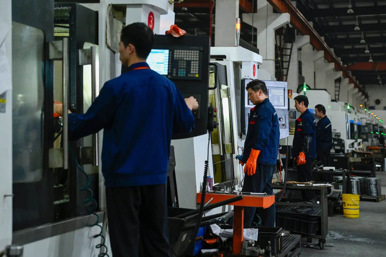 Hundreds of machines are operating at full capacity.